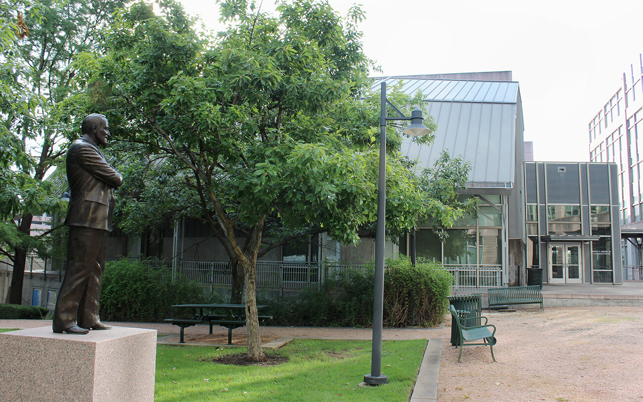 Picture of the courtyard with REJ building in background